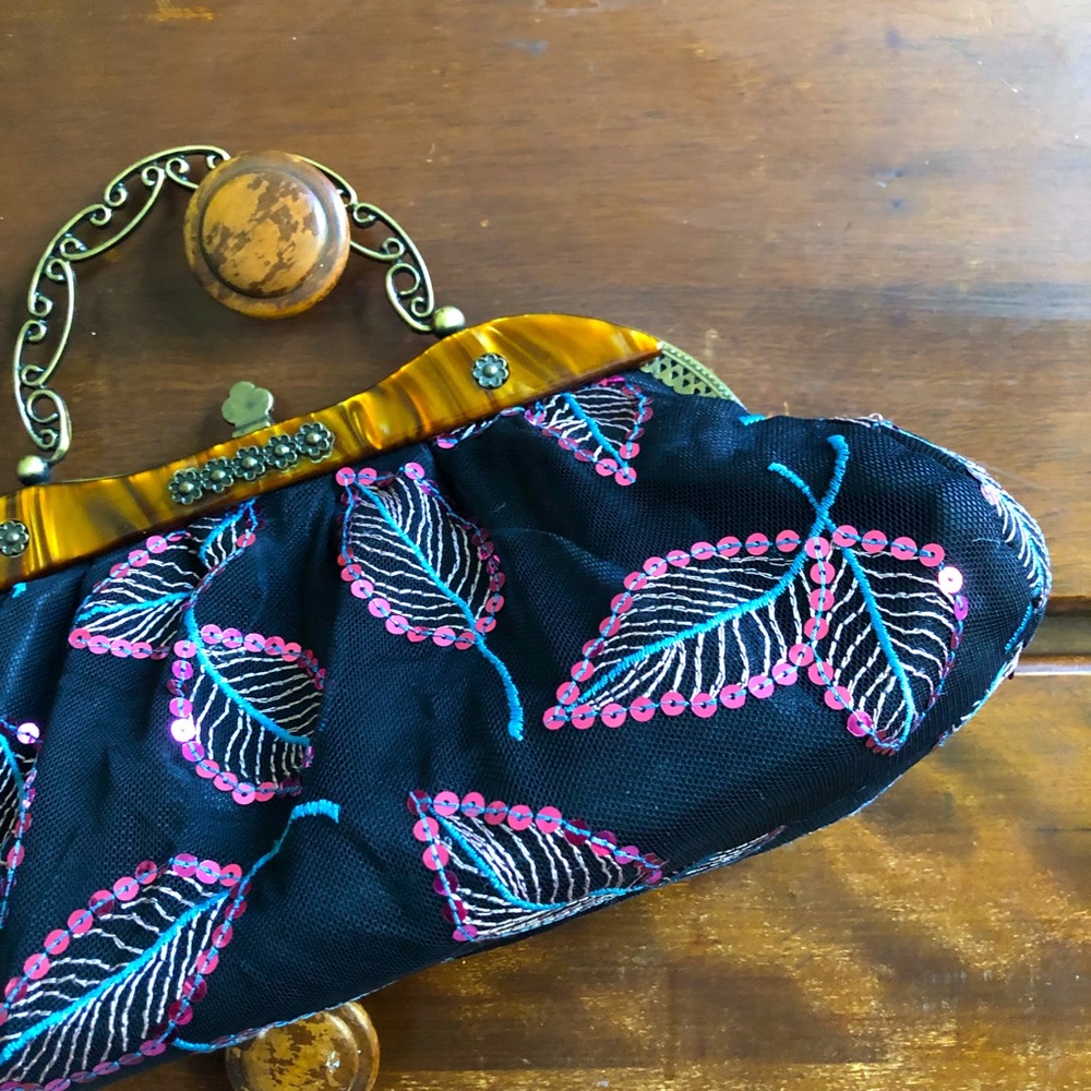 Sequence Handbag/ Shoulder Clutch